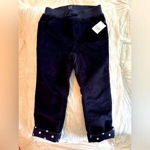 Gap corduroy, navy blue pants with adorable polkadot cuff bottoms. Size 4.